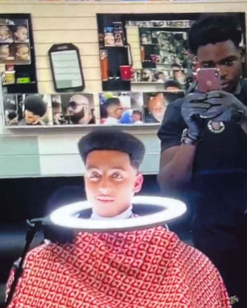 Early days at the barbershop &mdash; Mo filming a fresh cut for the socials